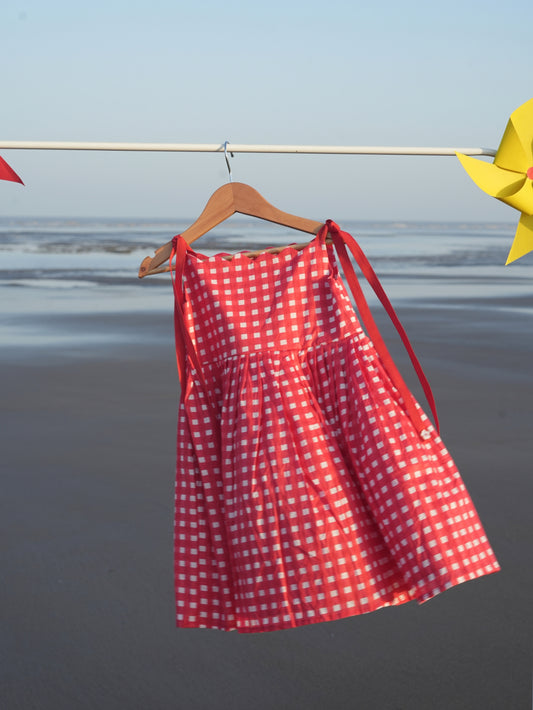Red checks tie up frock