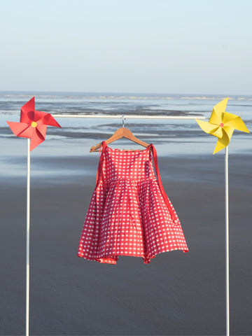 Red checks tie up frock