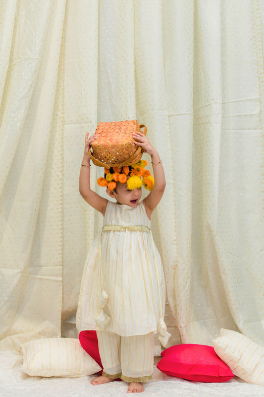 Ivory muslin peplum top and pant set