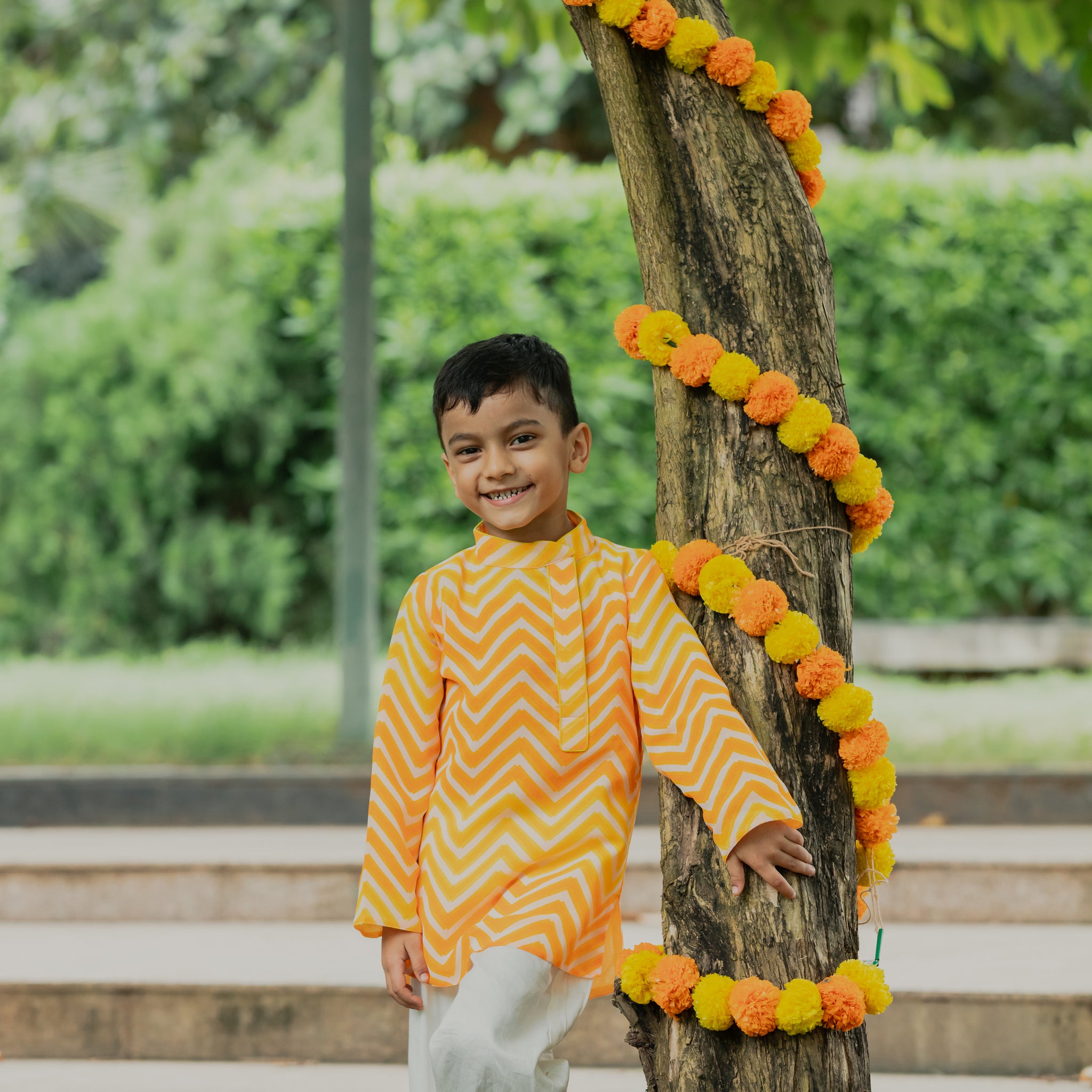 Yellow Orange Waves Printed Side Collared Neck Kurta And Off White Pants