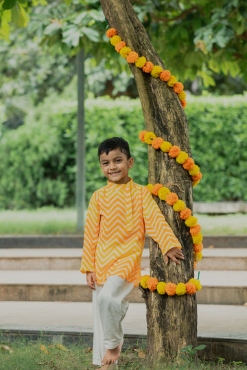 Yellow Orange Waves Printed Side Collared Neck Kurta And Off White Pants