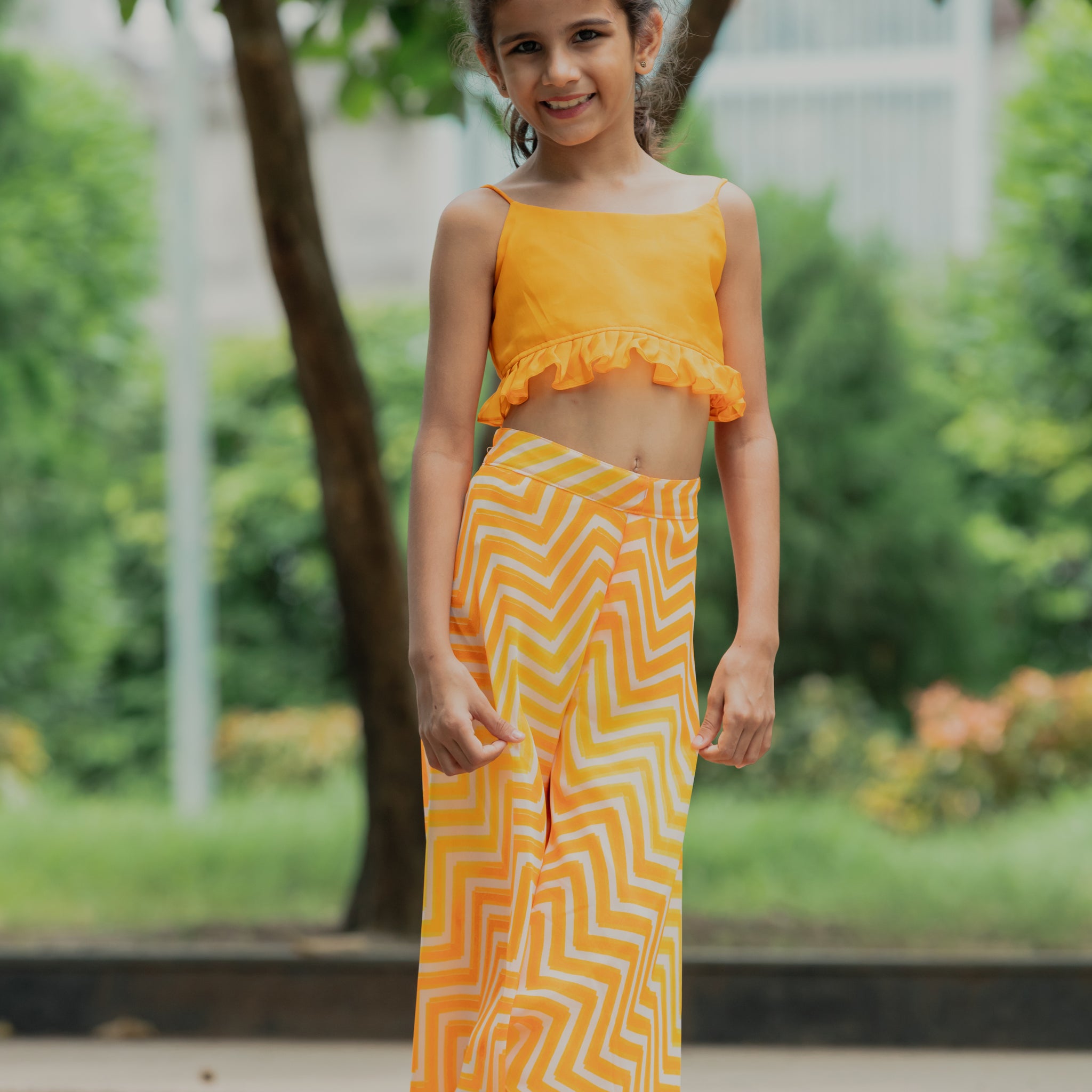 Kesari Top And Orange - Yellow Printed Waves Flared Pants