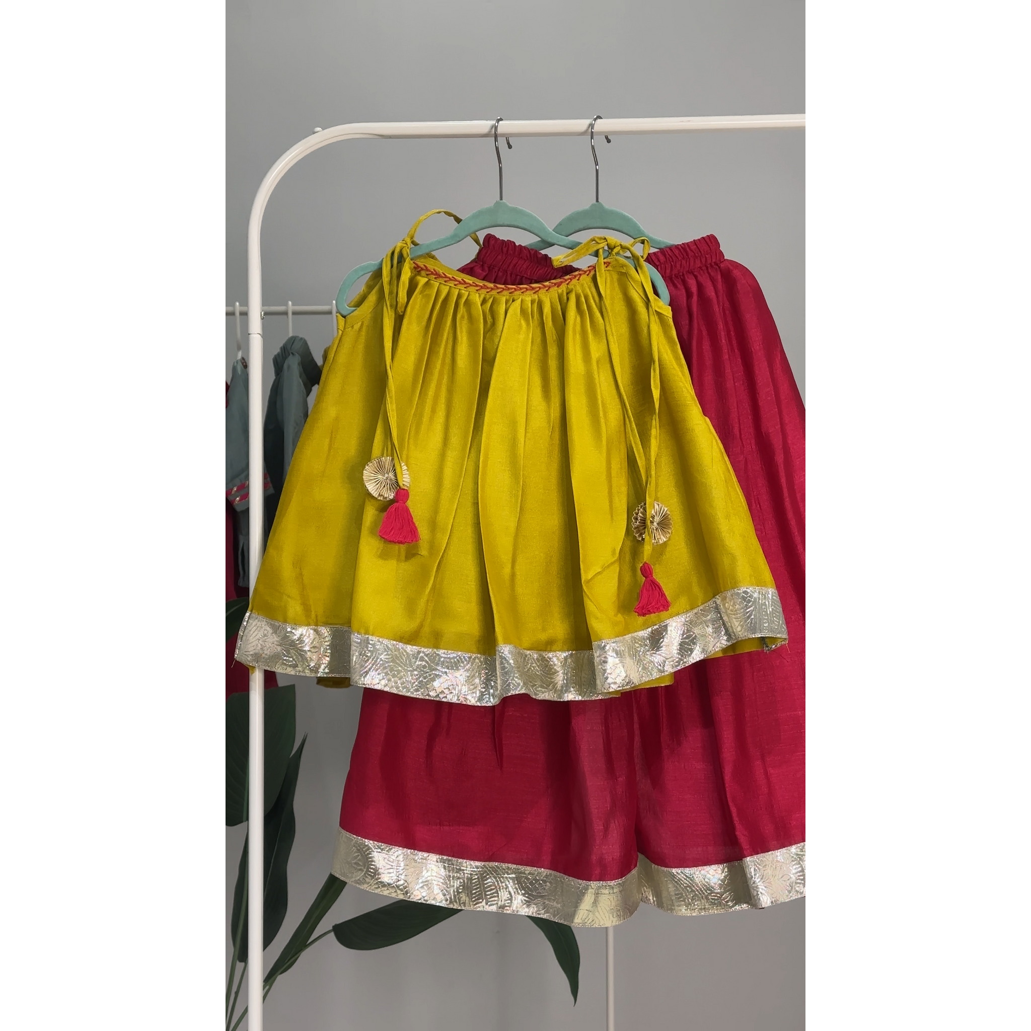 Munsell yellow tie up top & pink flared palazzo pants