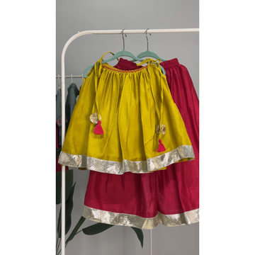 Munsell yellow tie up top & pink flared palazzo pants