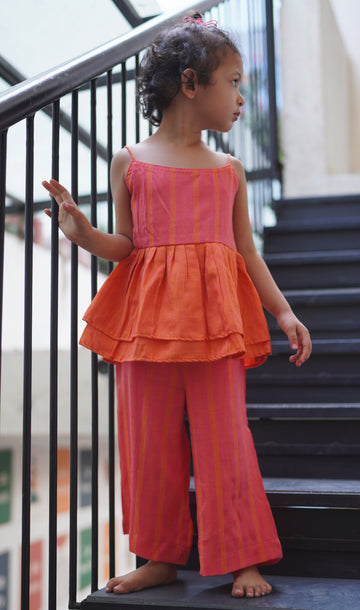 Tangy peplum top & pink pants